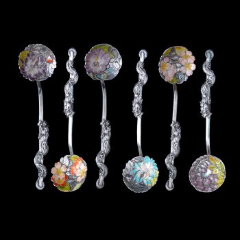 A set of six Japanese silver and enamel tea spoons with dragon
