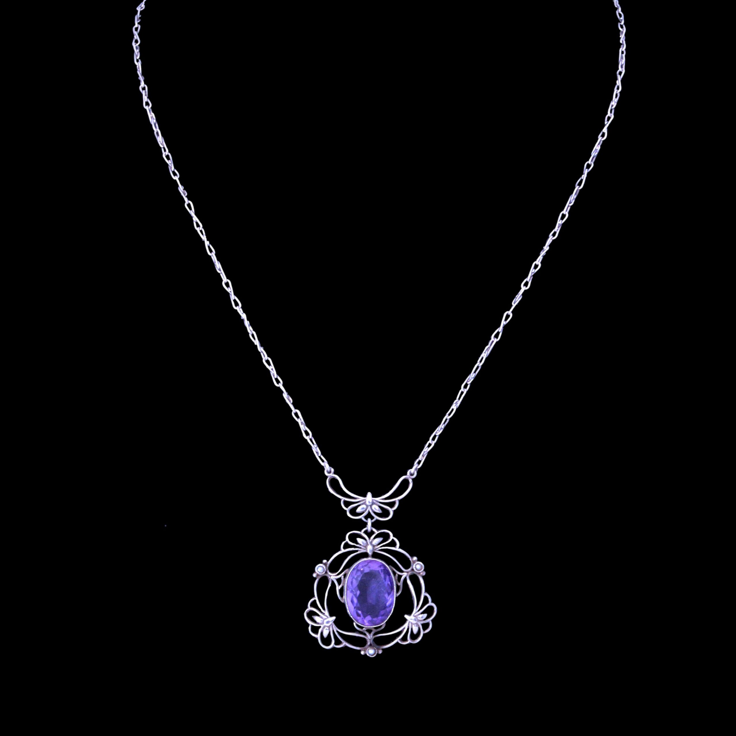 A silver and amethyst pendant by Liberty & Co - Image 2